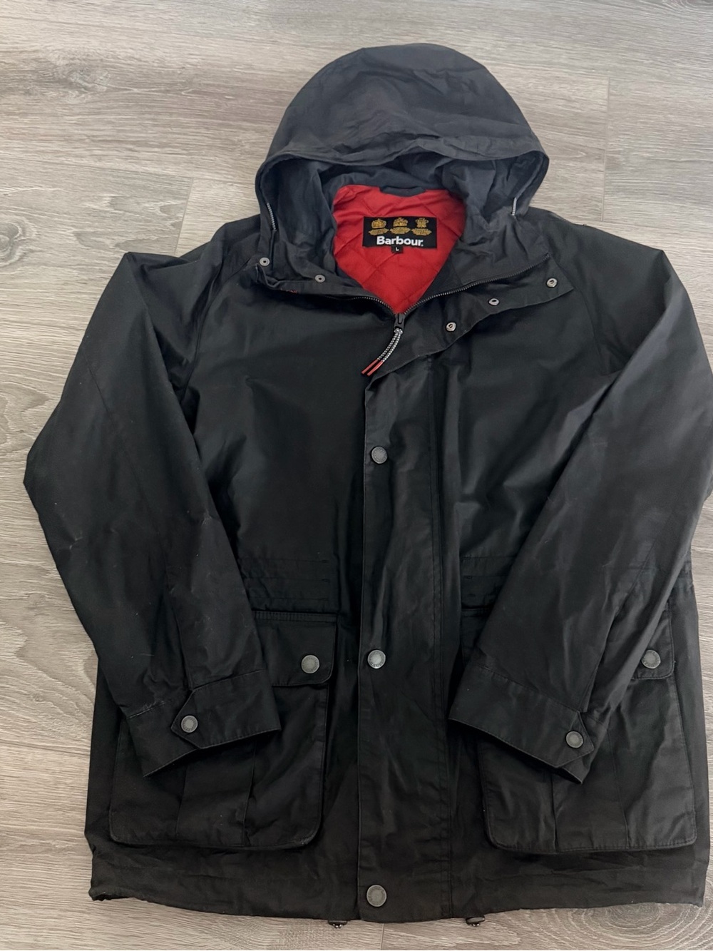 Barbour Black Hooded Raincoat with Red Quilted Lining
